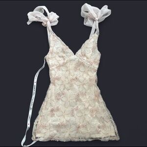 Lucy in the Sky “Textured Shimmer Floral Dress in Cream”